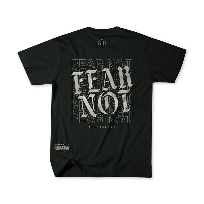 The Fear Not Premium Tee by 13th features bold, overlapping "FEAR NOT" text on the back for spiritual inspiration, with "THIRTEEN NIN" and Isaiah 41:10 near the hem as a reminder to walk in faith.